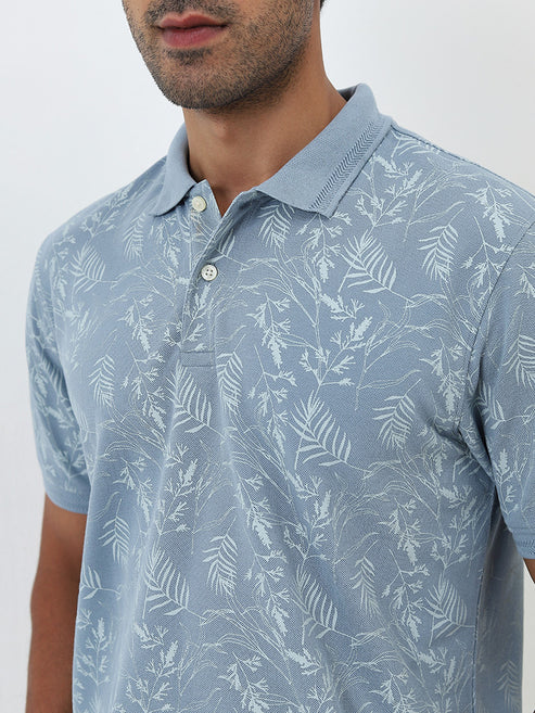 BHAYLA'S DUSTY BLUE LEAF PRINT COTTON-BLEND POLO T-SHIRT